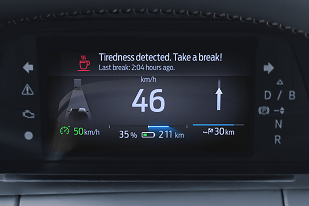 Close-up van het Driver Alert-dashboard van de Ford Capri® dat laat zien wanneer het tijd is om te rusten.